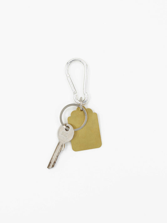 Tag, brass