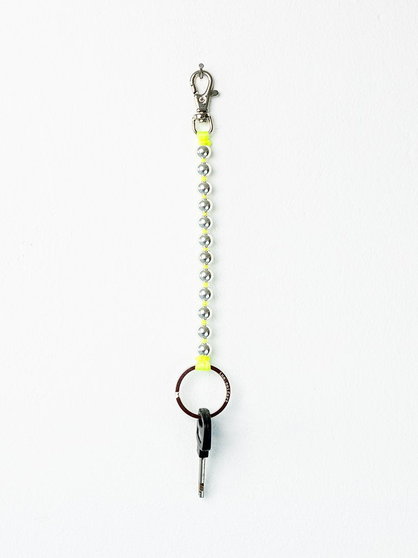 Perlen short, silver - neonyellow