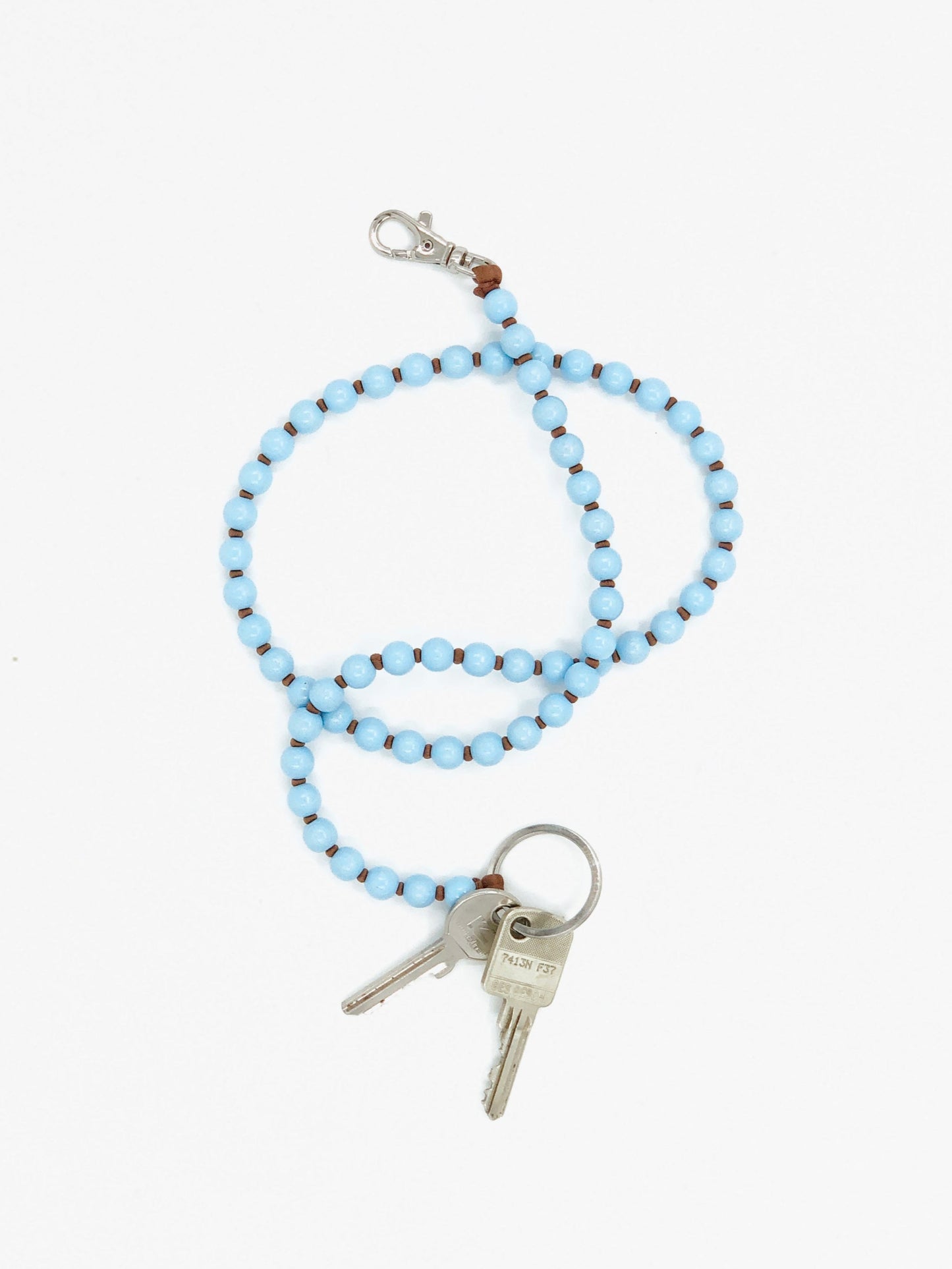 Perlen long, pastelblue-mocca